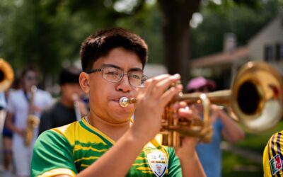 Marching Bands Break Camp with Neighborhood Parades