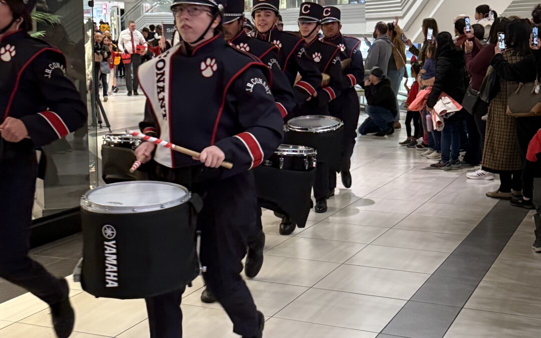 Conant Drumline Ramps Up Excitement as Woodfield Welcomes Santa