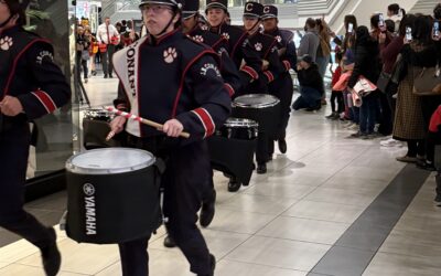 Conant Drumline Ramps Up Excitement as Woodfield Welcomes Santa