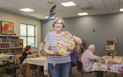 Library at Arlington Senior Center Gets into 100th Anniversary Fun